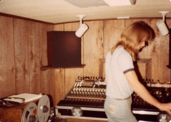 Photo of Jim Morris checking the mobile studio wiring
