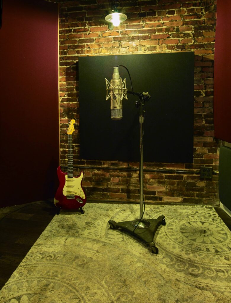 Neumann U47 microphone and electric guitar in an isolation booth at Morrisound Recording